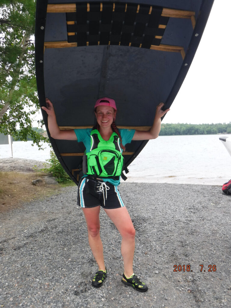 vanessa portaging a canoe