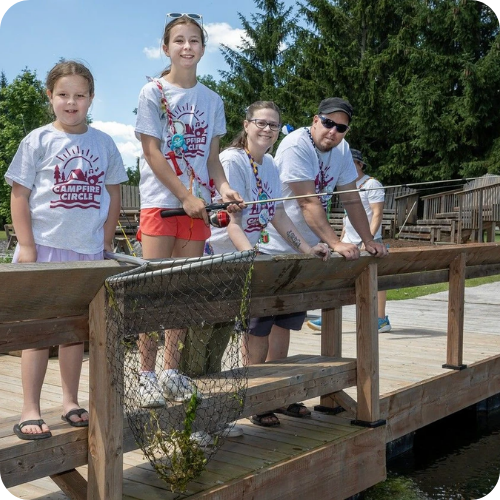 family on the dock at camp