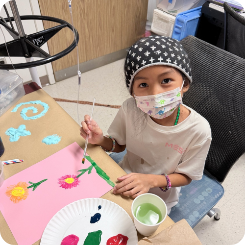 kursten painting in the hospital