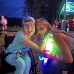 Judi (right) at campfire activity.