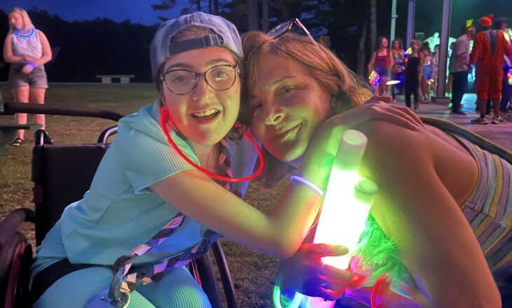 Judi (right) at campfire activity.