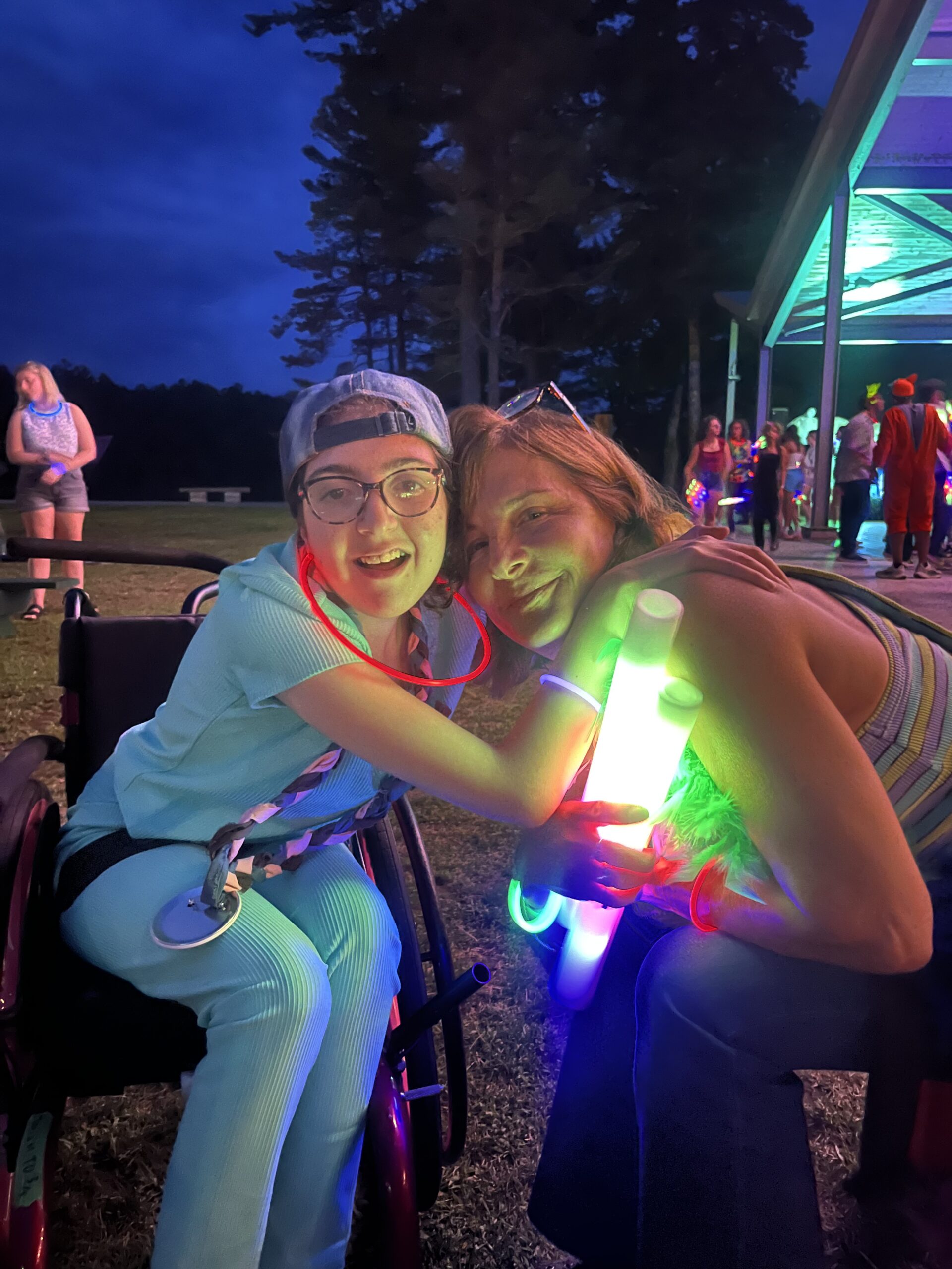 Judi (right) at campfire activity.