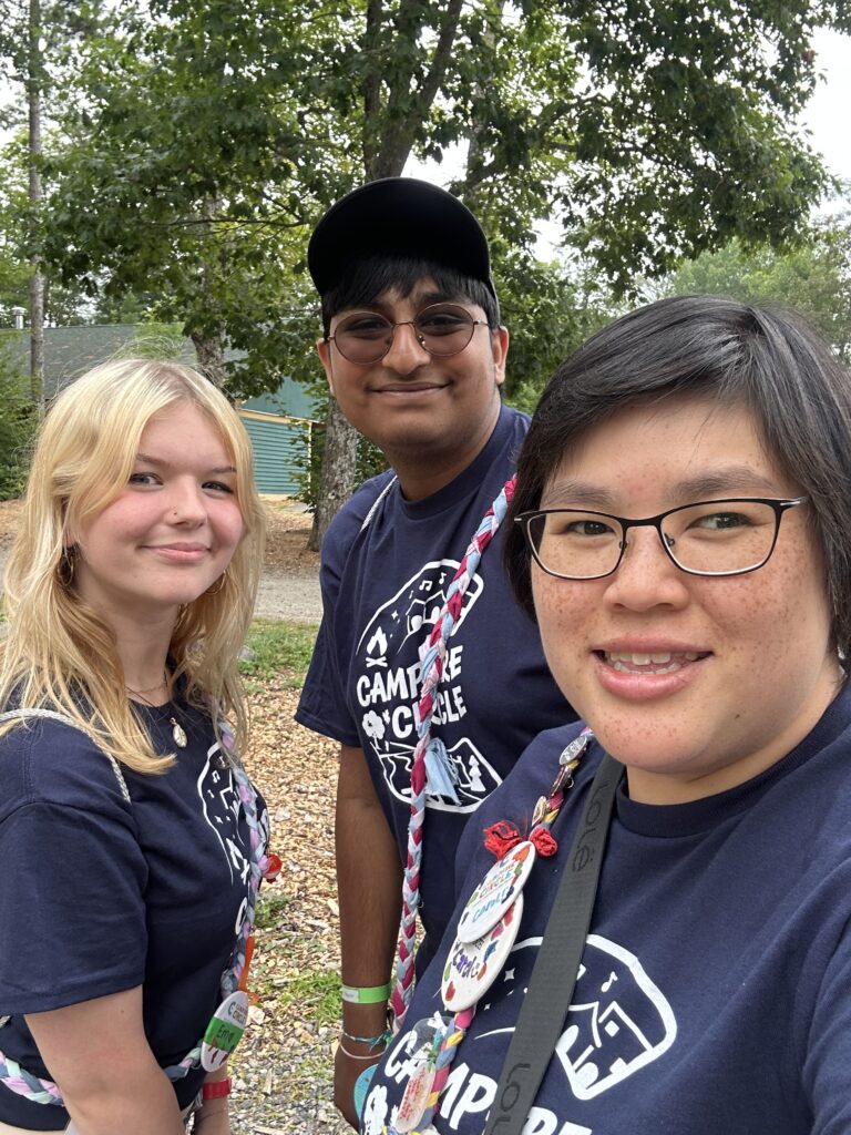 volunteers outside at camp