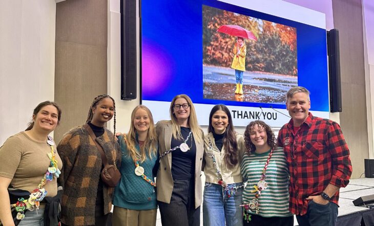 campfire circle staff and conference speakers in event space