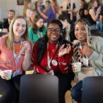 volunteers at camp event