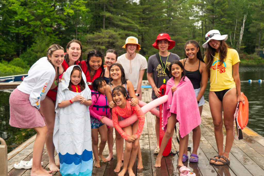 angelina and campers on the dock at camp