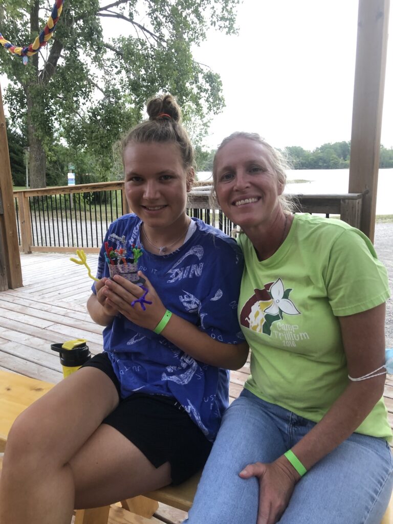 traci at camp with volunteer