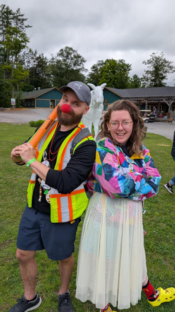 volunteers in costume outside at camp